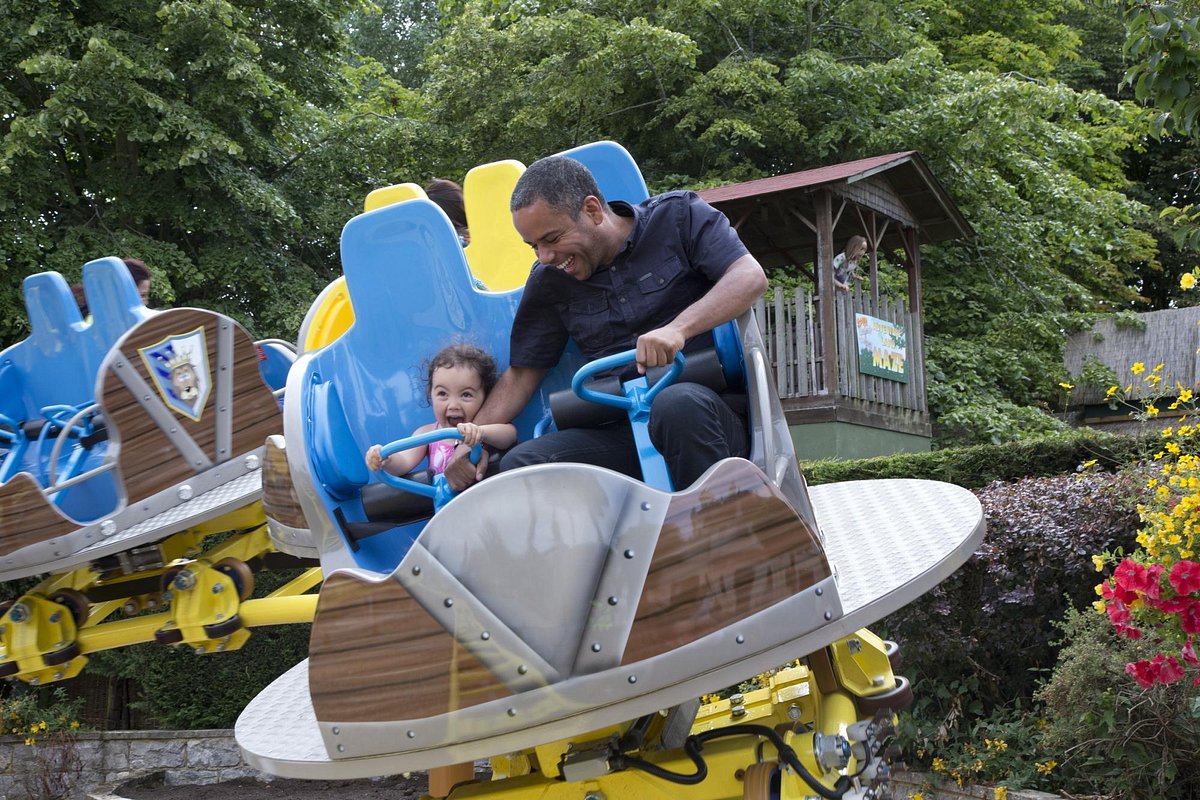 Families enjoying rides at Gulliver's Land